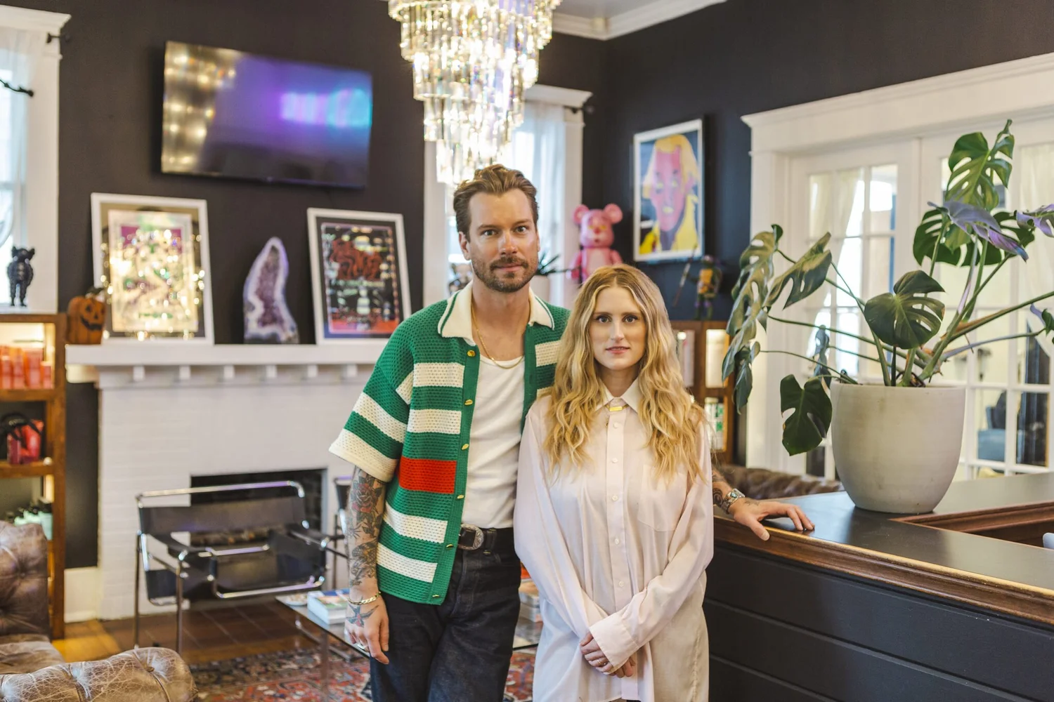 Hair House ATX owners standing inside the salon